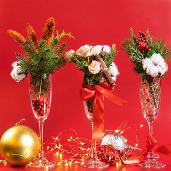 Christmas glass decor on the red background