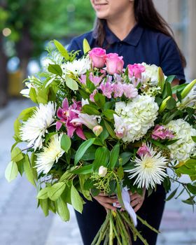 Woman holding beautiful bouquet flower