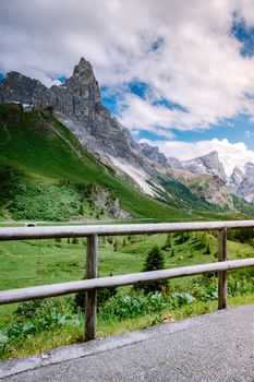 Pale di San Martino from Baita Segantini - Passo Rolle italy,Couple visit the italian Alps, View of Cimon della Pala, the best-know peak of the Pale di San Martino Group in the Dolomites, northern Italy Europe