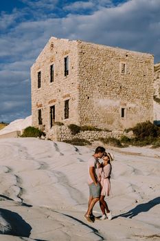 Punta Bianca, Agrigento in Sicily Italy White beach with old ruins of an abandoned stone house on white cliffs. Sicilia Italy, couple on vacation in Italy