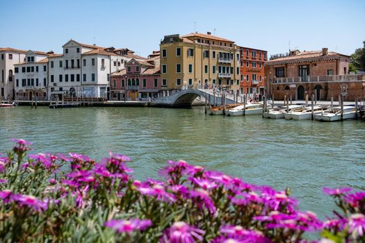 Beautiful venetian street in summer day, Italy. Venice Europe