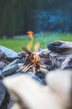 Making fire in the wood, camping outdoors