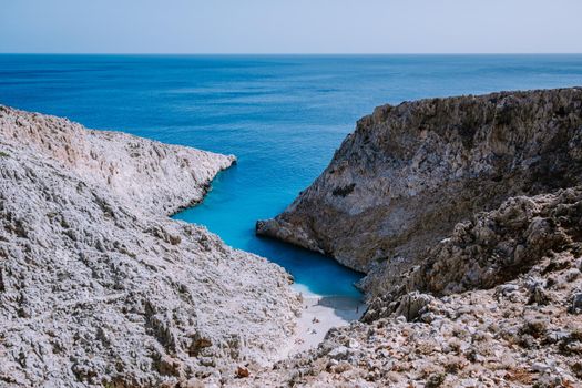 Crete Greece Seitan Limania beach with huge cliff by the blue ocean of the Island of Crete in Greece, Seitan limania beach on Crete, Greece. Europe