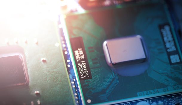 Computer chip on a circuit board, close up; Computer technology.