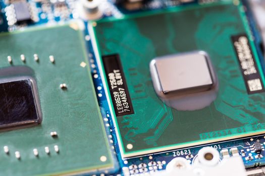 Computer chip on a circuit board, close up; Computer technology.