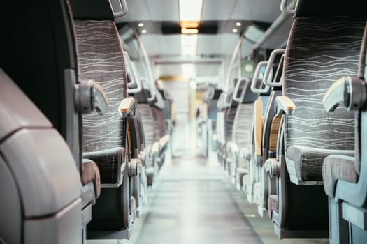 Interior of a public transport train, blurry background