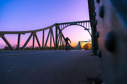 Silhouette of Glienicker Bridge in Berlin, evening scenery