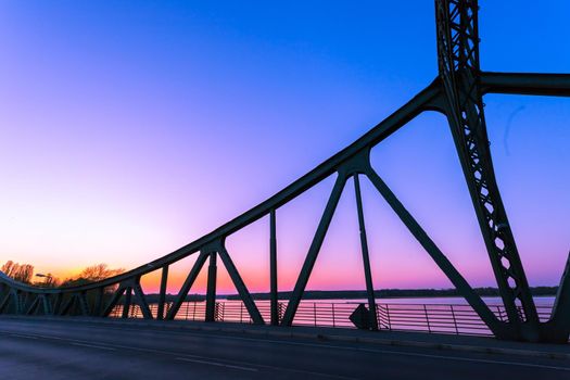 Silhouette of Glienicker Bridge in Berlin, evening scenery