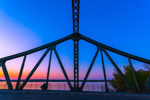 Silhouette of Glienicker Bridge in Berlin, evening scenery