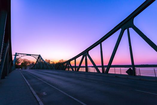 Silhouette of Glienicker Bridge in Berlin, evening scenery