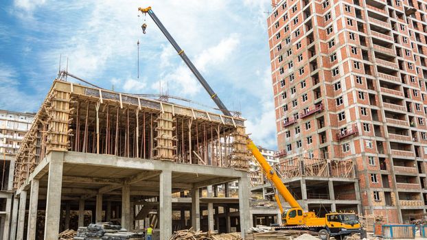 Crane truck on the construction site