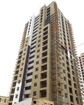 High buildings with scaffold at the construction site