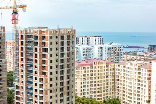 High buildings with scaffold at the construction site