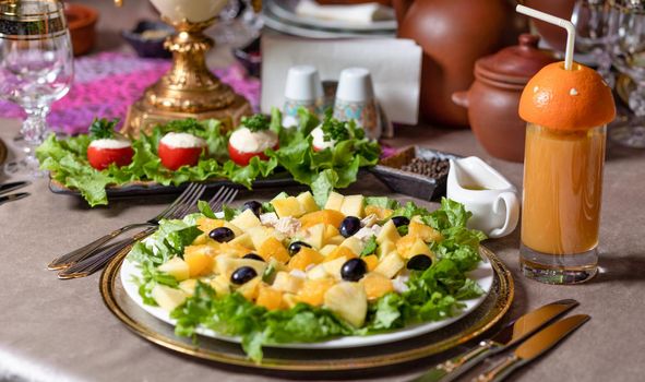 Tasty pumpkin salad on the table close up