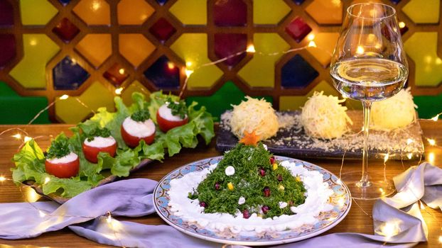 Salad like a new year tree with cheese balls