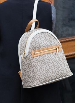 Close-up of elegant women's patterned backpack