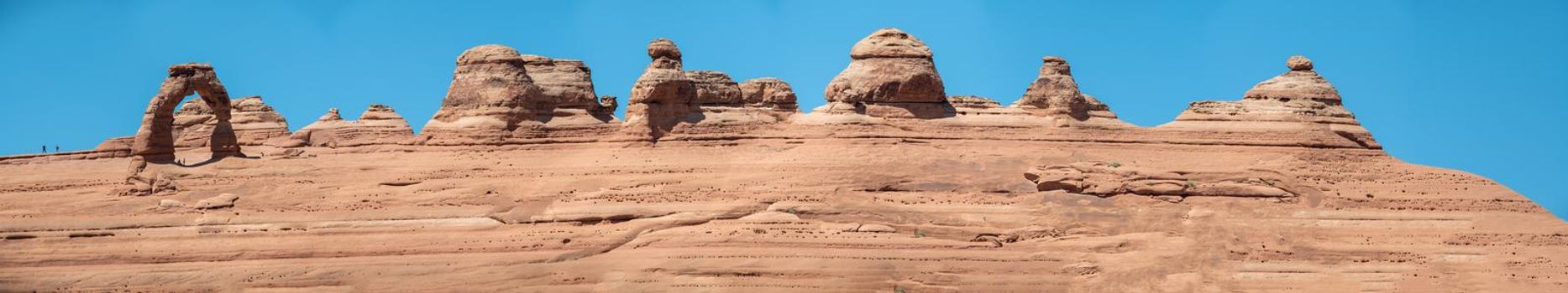 Delicate Arch panoramic aerial view from lower viewpoint, Arches National Park, Utah, USA