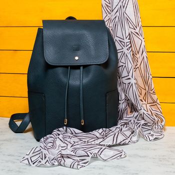 Black woman backpack with a scarf isolated