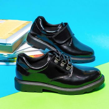 Black shiny boy male shoes isolated