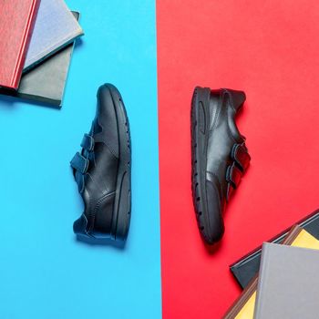Black sport shoes for man isolated top view