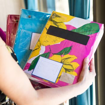 Woman holding colorful tablecloth set