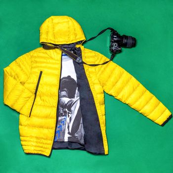 Yellow man jacket with a camera decor isolated