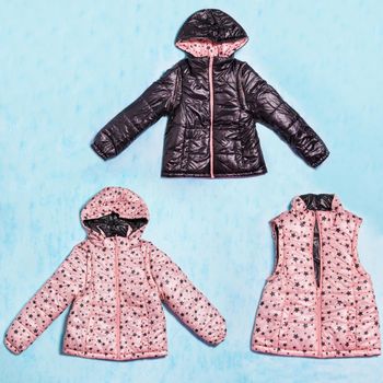 Pink and black girl jacket with hood isolated