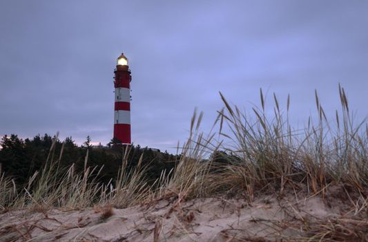 Panoramic image of the Wittduen lighthouse at daybreak, Amrum, Germany