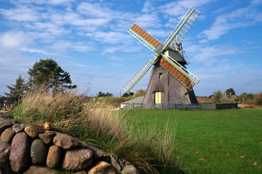 Panoramic image of the windmill of Nebel against blue sky, Amrum, Germany