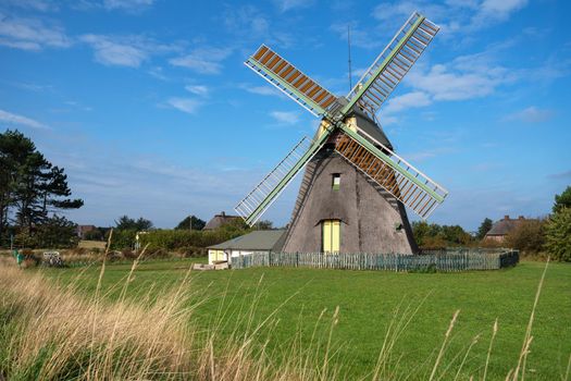 Panoramic image of the windmill of Nebel against blue sky, Amrum, Germany