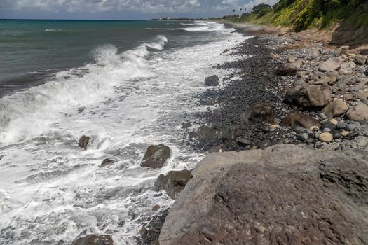 Pebble, gravel beach at Sainte Suzanne on Reunion island, France, Indian Ocean