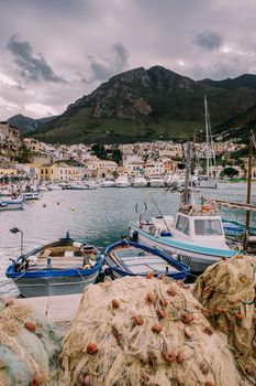 Sicily Italy October 2020 fishing boats at the Sicilian port of Castellammare del Golfo, amazing coastal village of Sicily island, province of Trapani, Italy. High quality photo