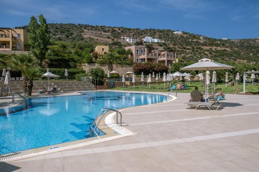 Crete Greece, Candia park village a luxury holiday village in Crete Greece by the ocean in traditional colors. Luxury holiday resort with pool