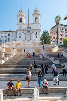 Rome September 2020, The Spanish Steps in Rome, Italy. The famous place is a great example of Roman Baroque Style with people with mouth protection during the covid 19 outbreak Italy Corona virus 