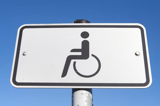 Traffic sign for a parking lot for disabled people