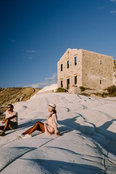 Punta Bianca, Agrigento in Sicily Italy White beach with old ruins of an abandoned stone house on white cliffs. Sicilia Italy, couple on vacation in Italy