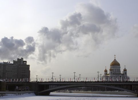 February 4, 2012, Moscow, Russia. Cathedral of Christ the Savior and Bolshoi Kamenny Bridge in winter in frosty weather.