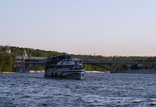 May 25, 2012, Moscow, Russia. Pleasure motor ship on the Moskva River on a warm spring evening.