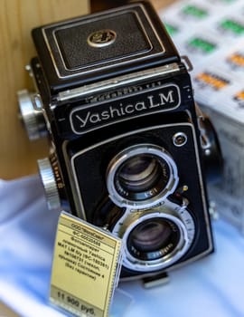 August 18, 2018 Moscow, Russia. Medium format film camera Yashica LM on a store counter.