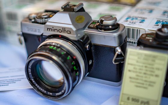 August 18, 2018 Moscow, Russia. Manually operated 35mm single-lens reflex camera Minolta XG-1 on the counter of the store.