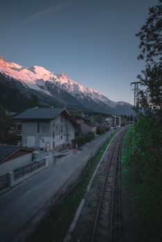 A railway running through an alpine town in France.