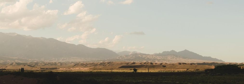 Rolling hills in the arid Uspallata, in Mendoza, Argentina. Wide panoramic shot.