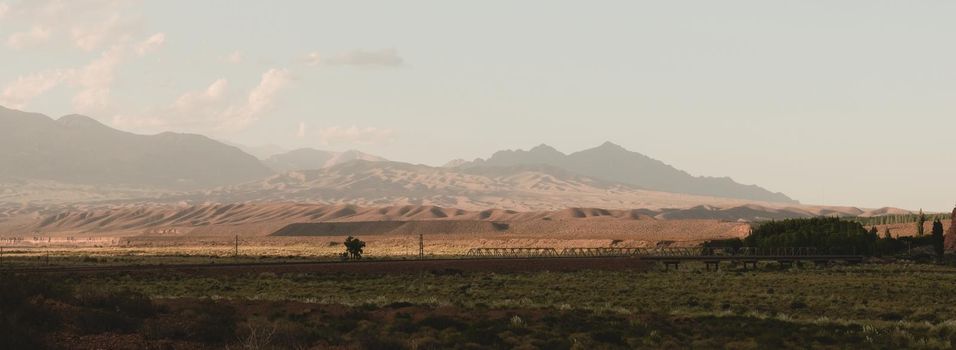 Rolling hills in the arid Uspallata, in Mendoza, Argentina. Wide panoramic shot.
