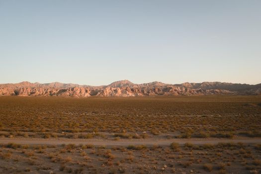 Dirt road across the desert near Uspallata, Mendoza, Argentina.