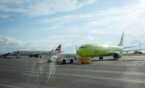 SIMFEROPOL, RUSSIA, JULY 28, 2017 SIMFEROPOL, RUSSIA, JULY 28, 2017 Boeing 737-8 S7 airlines and Airbus A321-200 Nordwind Airlines at the International Airport of Simferopol.