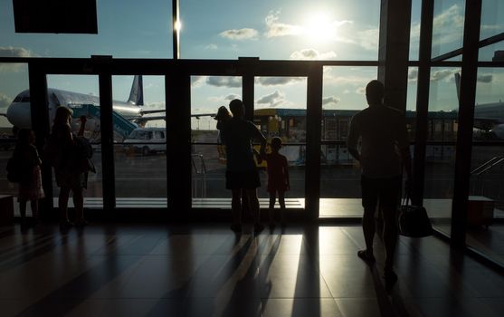 SIMFEROPOL, RUSSIA, JULY 28, 2017 Silhouettes of passengers at the International Airport of Simferopol