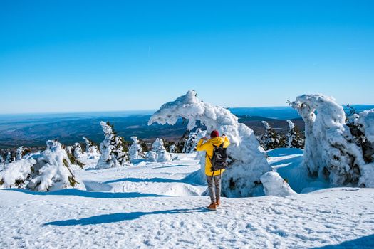 Harz national park Germany, Brocken through winter landscape, winter mountain . Brocken, Harz National Park Mountains in Germany. Europe