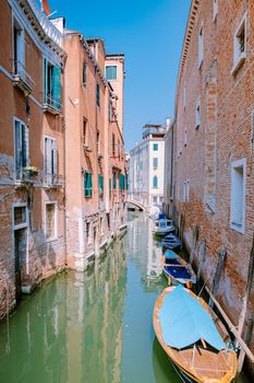 Beautiful venetian street in summer day, Italy. Venice Europe