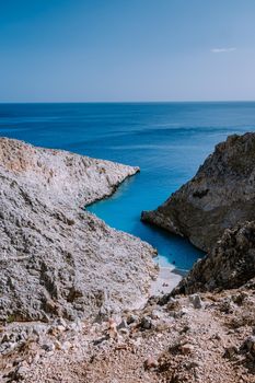Crete Greece Seitan Limania beach with huge cliff by the blue ocean of the Island of Crete in Greece, Seitan limania beach on Crete, Greece. Europe