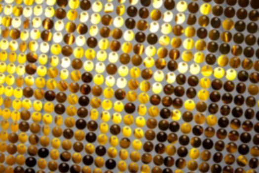Abstract golden background. Blurred circular elements